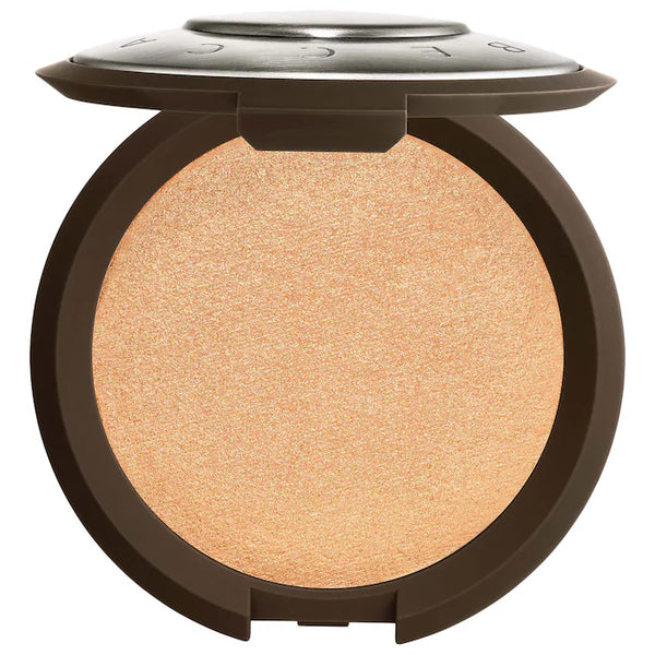 Becca Champagne Pop - a soft gold with pinky-peach pearl - recommended for all skintones