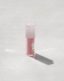 FENTY BEAUTY GLOSS BOMB HEAT UNIVERSAL LIP LUMINIZER + PLUMPER SHADE Fu$$y fussy - Sheer Pink